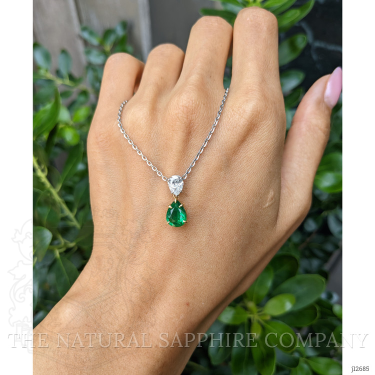 1.18 Ct. Emerald and Natural Diamond Accent Stones Pendant, Platinum & 18K Yellow