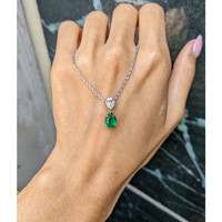 1.18 Ct. Emerald and Natural Diamond Accent Stones Pendant, Platinum & 18K Yellow Life Style
