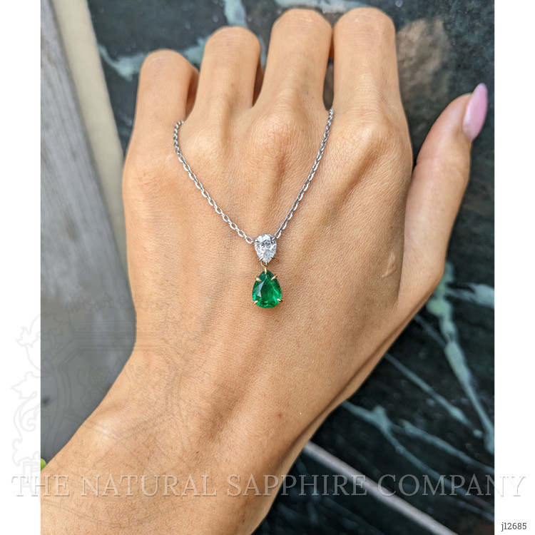 1.18 Ct. Emerald and Natural Diamond Accent Stones Pendant, Platinum & 18K Yellow