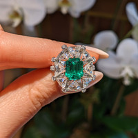 3.14 Ct. Emerald and Natural Diamond Halo Ring, Platinum & 18K Yellow Life Style