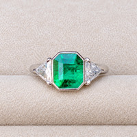 2.14 Ct. Emerald and Natural Diamond Three Stone Ring, Platinum 950 Life Style