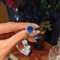 4.48 Ct. Blue Sapphire and Natural Diamond Halo Ring, 18K White Gold Life Style