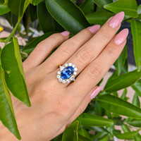 5.28 Ct. Blue Sapphire and Natural Diamond Halo Ring, 18K Yellow Gold Life Style