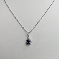 0.60 Ct. Blue Sapphire and Natural Diamond Pave Pendant, 18K White Gold Life Style