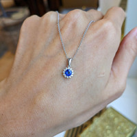 0.30 Ct. Blue Sapphire and Natural Diamond Halo Pendant, 18K White Gold Life Style