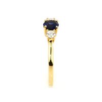 0.63 Ct. Blue Sapphire and Natural Diamond Three Stone Ring, 18K Yellow Gold Image