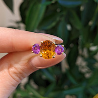 3.14 Ct. Orange Sapphire and Pink Sapphire Three Stone Ring, 18K Yellow Gold Life Style