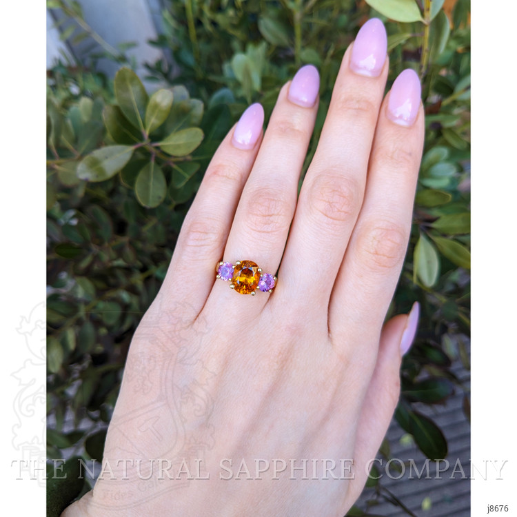 3.14 Ct. Orange Sapphire and Pink Sapphire Three Stone Ring, 18K Yellow Gold