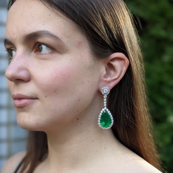 Long emerald deals earrings