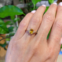 0.98 Ct. Orangish Yellow Sapphire and Natural Diamond Three Stone Ring, 14K Yellow Gold Life Style