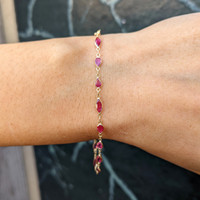 1.45&nbsp;Ct.Tw.Total Carat Weight Pinkish Red Ruby Accent Stones Bracelet, 18K Yellow Gold Life Style
