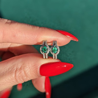 0.30 Ct.Tw.Total Carat Weight Emerald and Diamond Earrings - 18K White Gold Life Style
