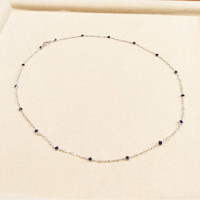 2.24 Ct. Blue Sapphire and White Sapphire Bezel Necklace, 18K White Gold Life Style