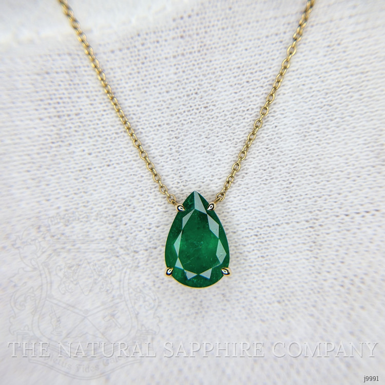 1.56 Ct. Emerald Halo Pendant, 14K Yellow Gold