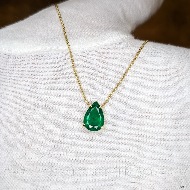 1.56 Ct. Emerald Halo Pendant, 14K Yellow Gold