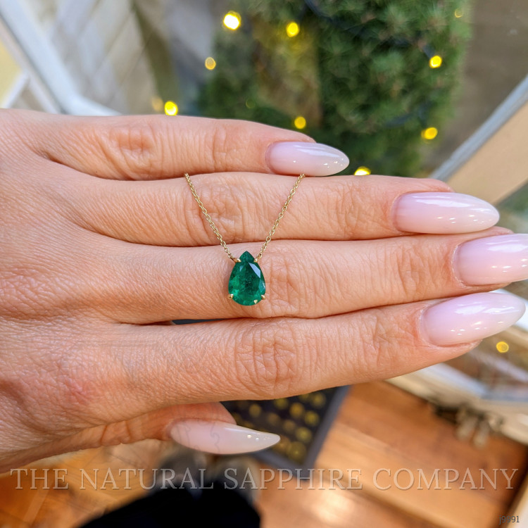 1.56 Ct. Emerald Halo Pendant, 14K Yellow Gold