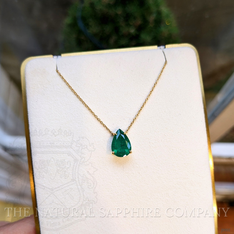 1.56 Ct. Emerald Halo Pendant, 14K Yellow Gold