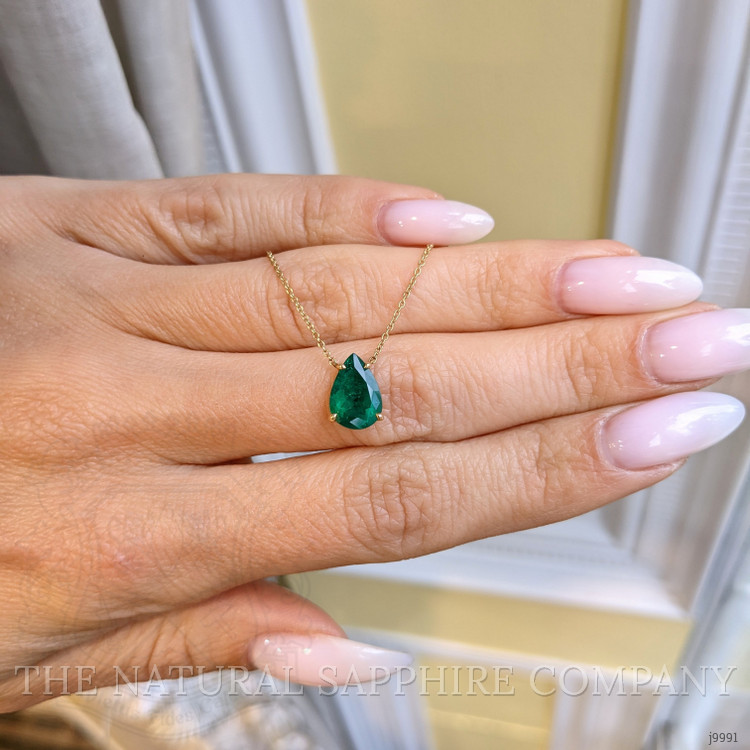 1.56 Ct. Emerald Halo Pendant, 14K Yellow Gold