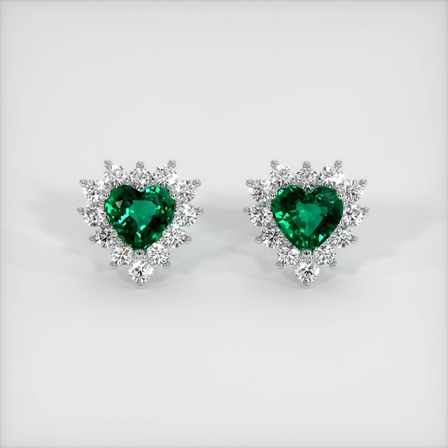 Heart shaped emerald on sale earrings