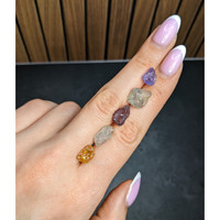 22.69 Ct. Multi Color Rough Sapphire from Madagascar Life Style
