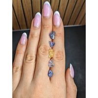 13.47 Ct. Multi Color Rough Sapphire from Madagascar Life Style