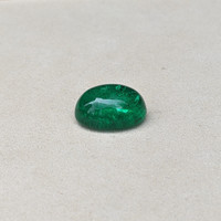 29.77 Ct. Cabochon Emerald from Colombia Life Style