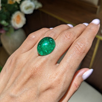 29.77 Ct. Cabochon Emerald from Colombia Life Style