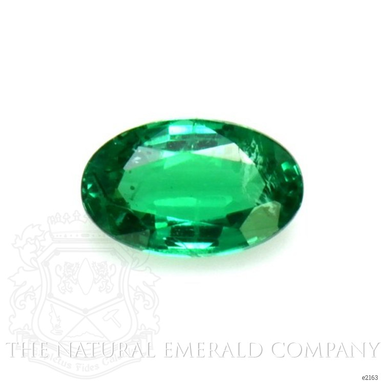 Solitaire Emerald Ring 0.23 Ct., 18K White Gold