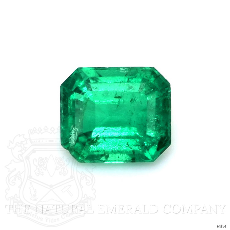 Three Stone Emerald Ring 0.70 Ct., 18K White Gold