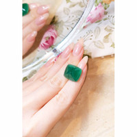 21.36 Ct. Cabochon Emerald from Zambia Life Style