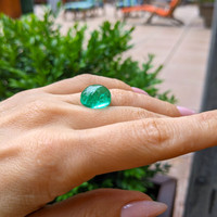11.86 Ct. Cabochon Emerald from Colombia Life Style