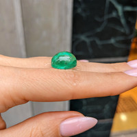 11.86 Ct. Cabochon Emerald from Colombia Life Style