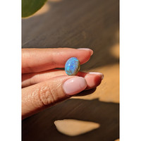 6.26 Ct. Cabochon Semi-Black Opal from Australia Life Style