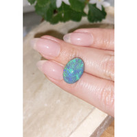 7.04 Ct. Cabochon Semi-Black Opal from Australia Life Style