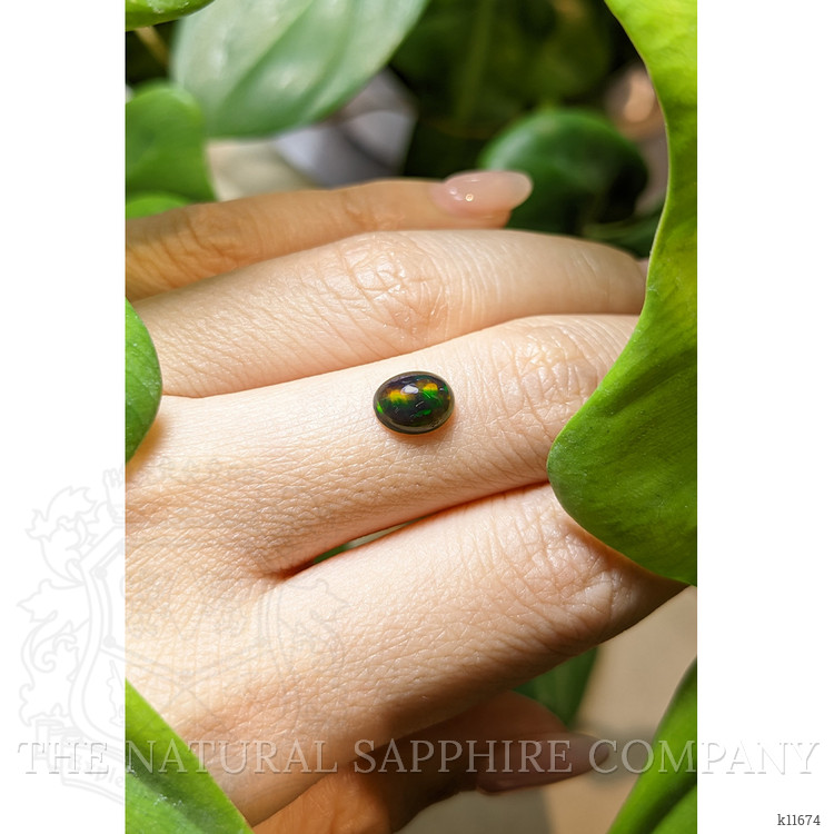 0.83 Ct. Cabochon Black Opal from Ethiopia