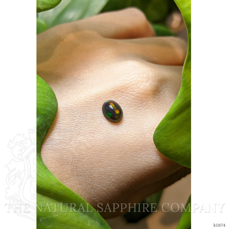 0.83 Ct. Cabochon Black Opal from Ethiopia