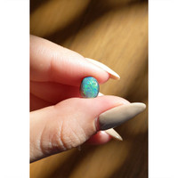 1.63 Ct. Semi-Black Opal from Australia Life Style