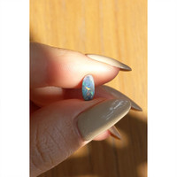 0.64 Ct. Semi-Black Opal from Australia Life Style