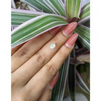 0.68 Ct. Cabochon White Opal from Australia Life Style