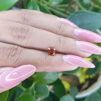 0.74 Ct. Spessartite Garnet from Madagascar Life Style