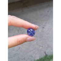 24.81 Ct. Violetish Blue Cabochon Tanzanite from Tanzania Life Style