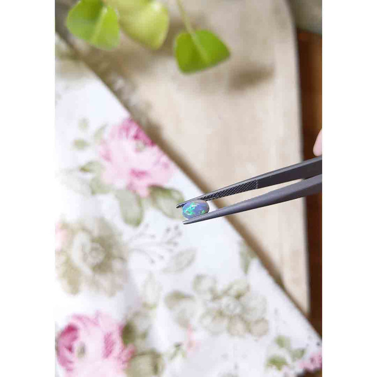 0.55 Ct. Cabochon Black Opal from Australia