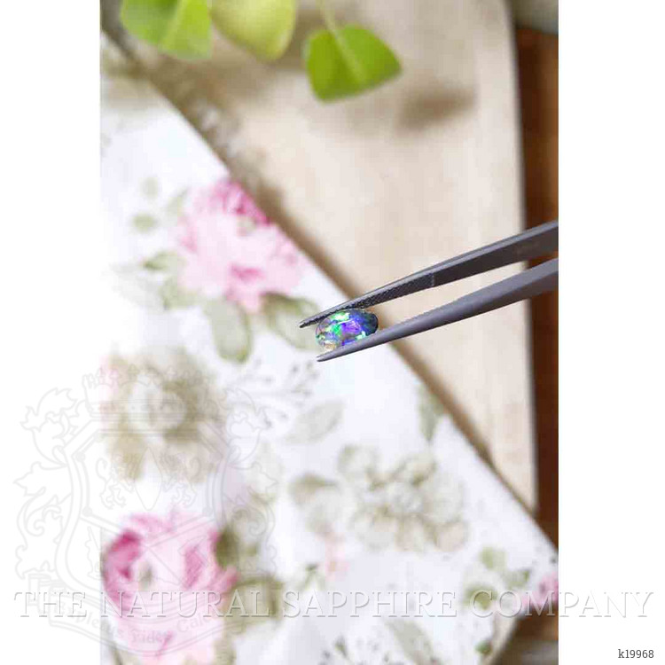 0.73 Ct. Cabochon Black Opal from Australia