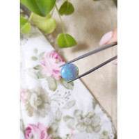 4.32 Ct. Cabochon Semi-Black Opal from Australia Life Style