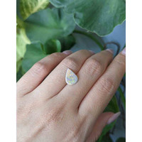 0.98 Ct. Cabochon Boulder Opal from Australia Life Style