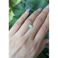 0.77 Ct. Cabochon Boulder Opal from Australia Life Style