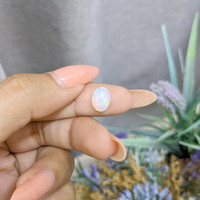 1.58 Ct. Multi Color Cabochon White Opal from Ethiopia Life Style