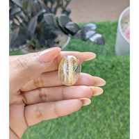 33.09 Ct. Yellow Cabochon Rutilated Quartz from Madagascar Life Style