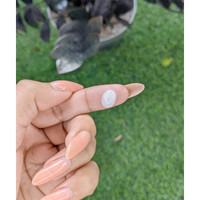 1.96 Ct. Multi Color Cabochon White Opal from Ethiopia Life Style