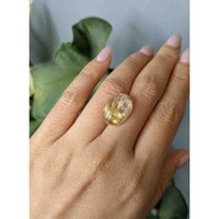 10.41 Ct. Cabochon Rutilated Quartz from Madagascar Life Style